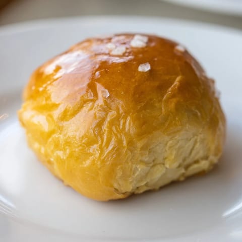 Buttery Quick-Rise Dinner Rolls, fresh from the oven, ready to be slathered in butter.