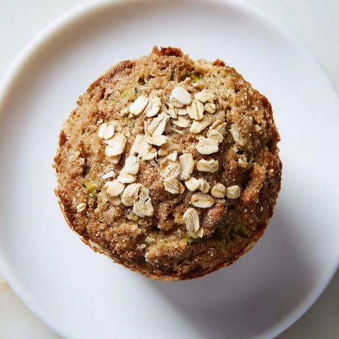 Warm, soft freezer-friendly breakfast muffins are shown with fluffy texture; ideal for a quick bite.