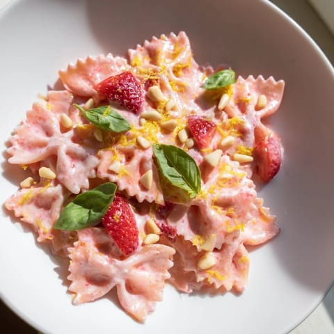 Creamy Strawberry Sour Cream Pasta, perfect for summer: pasta coated in a sweet and tangy pink sauce.